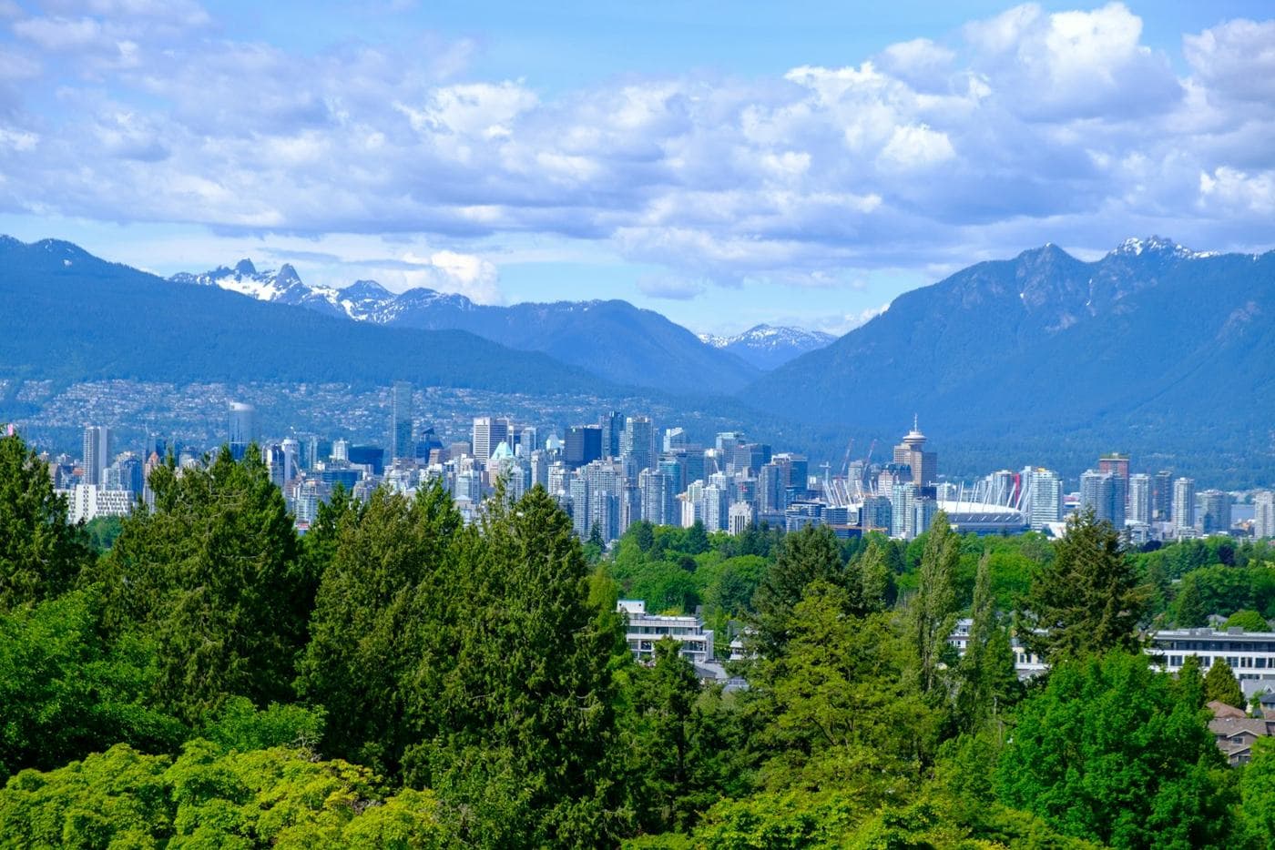 Downtown Vancouver and the mountains seen from Queen Elizabeth Park