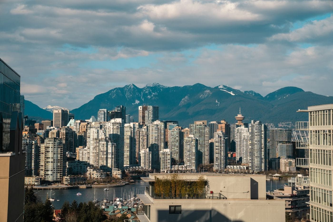 Downtown Vancouver towers in front of the mountains