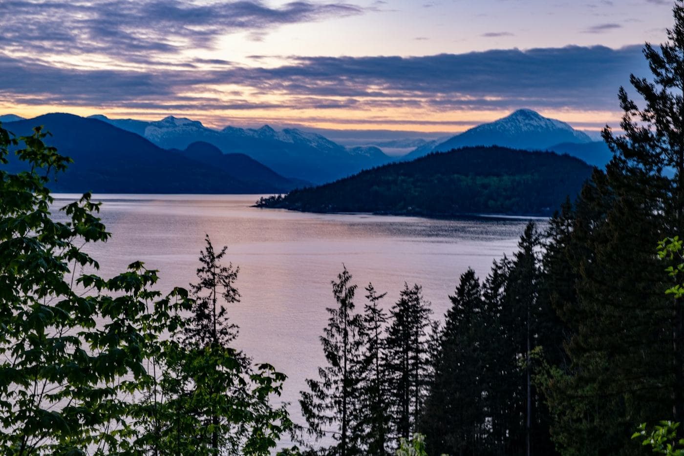 Sunset over Howe Sound through the trees